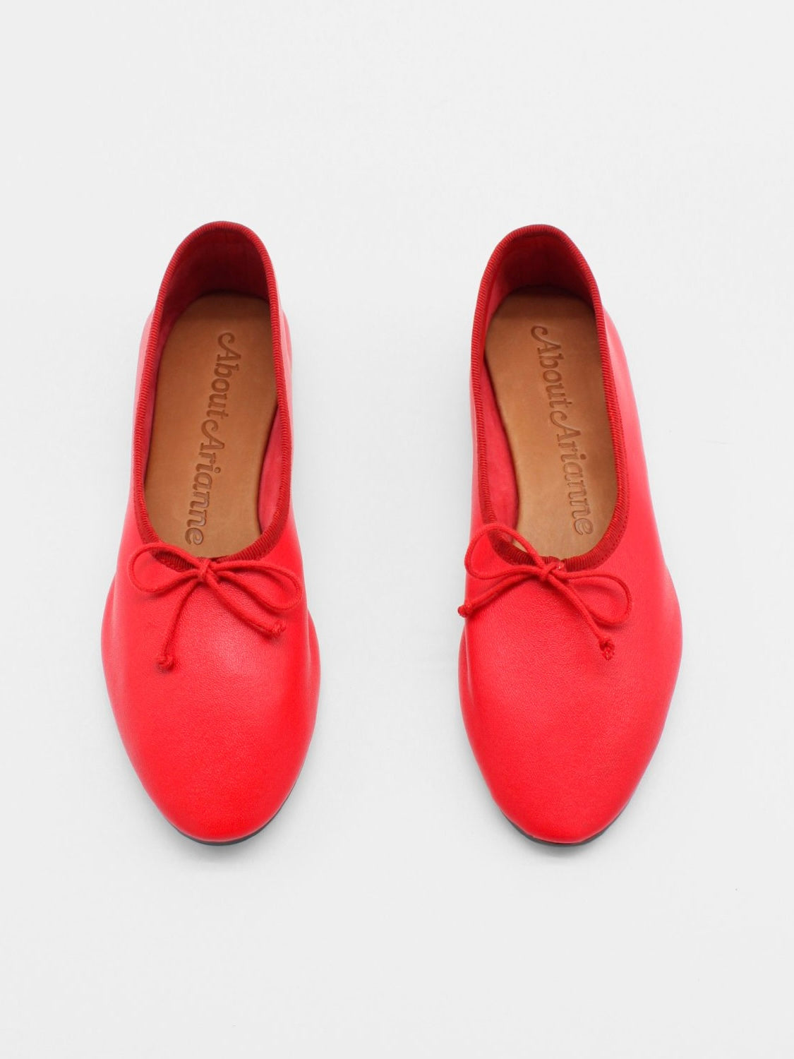 About Arianne Mila Flat in Red – F U G G I A M O
