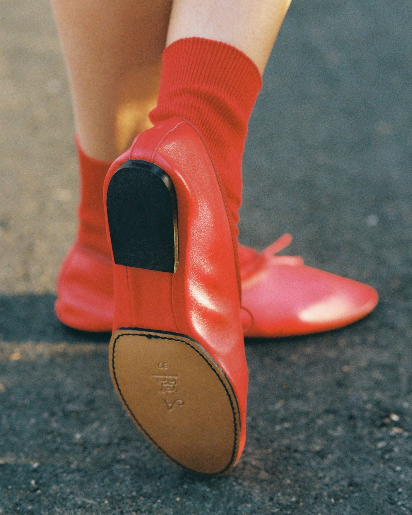 Model wearing Mila Ballet Flat in Red Leather